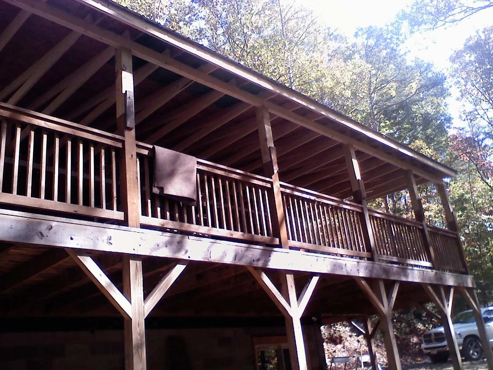 Timber framing under a new elevated porch and deck — Roof Leak Repair in Howells by Roofing Brothers